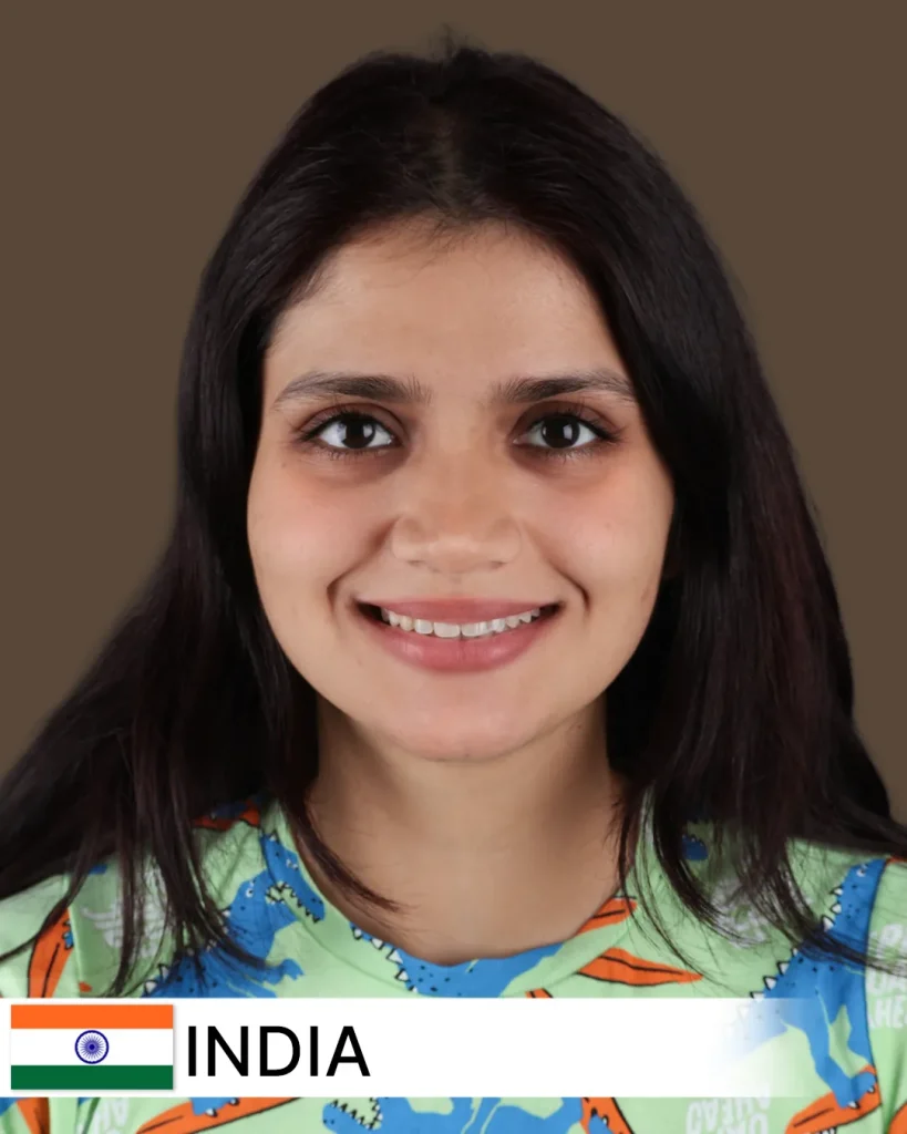 Smile makeover patient from India with a confident, bright smile