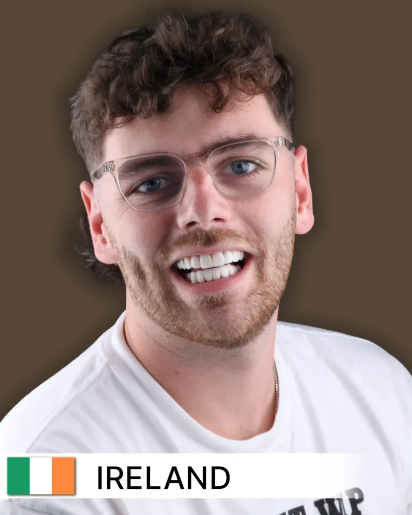 Close-up of a smiling patient, likely in their 30s or 40s, showcasing noticeably whiter, straighter, and evenly aligned teeth after a successful smile makeover. The soft, blurred background suggests a modern dental clinic setting in Ireland.